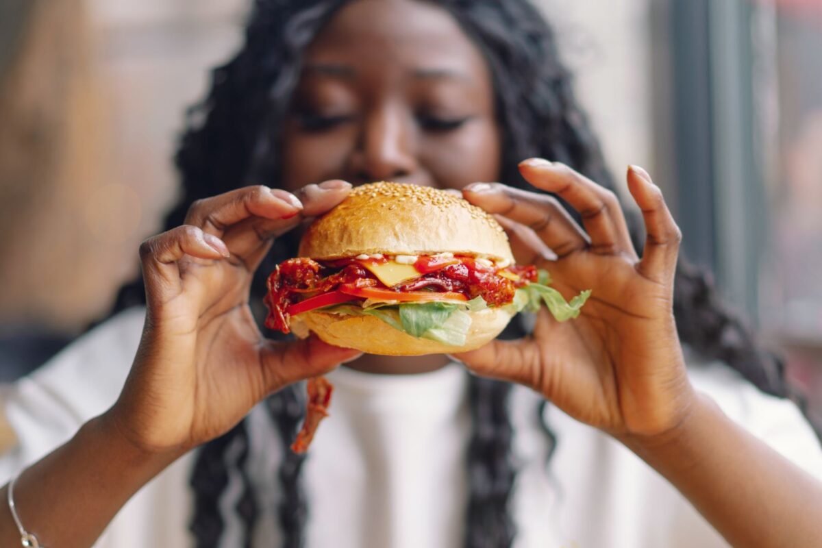 woman eating a burger