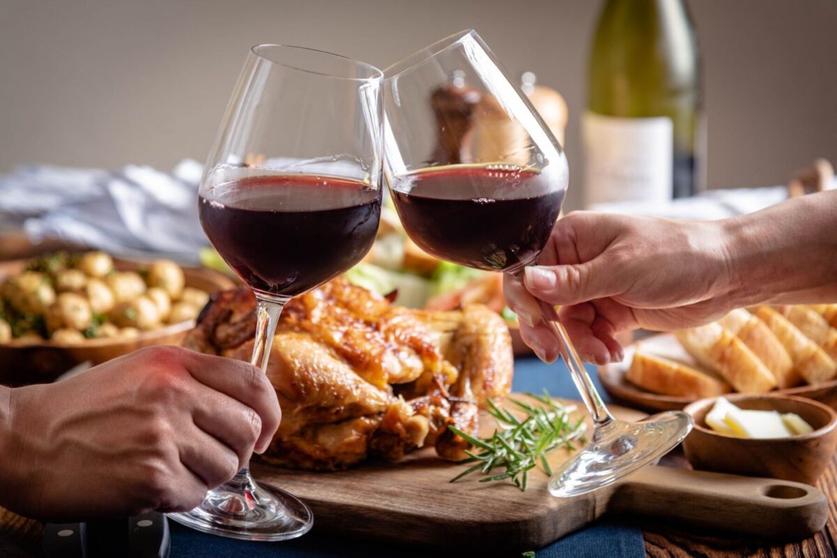 couple sharing thanksgiving feast in naples florida